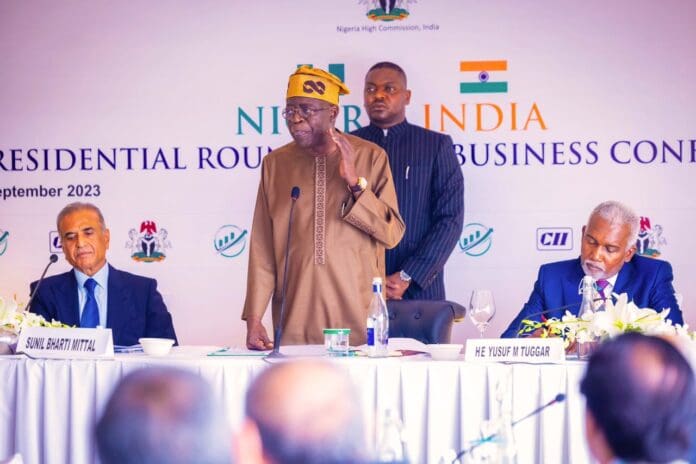 Nigerian President Bola Tinubu speaking at trade conference in New Delhi.