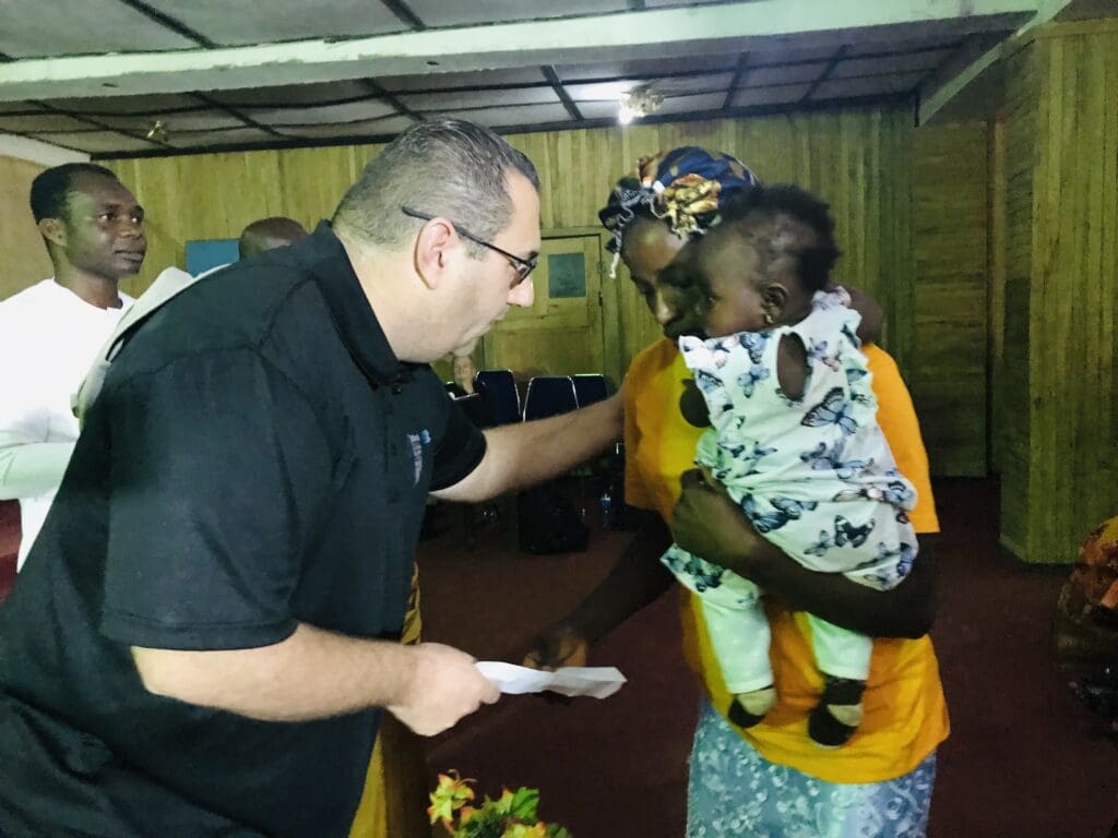 Judd presents cash donation to a widow in Jos