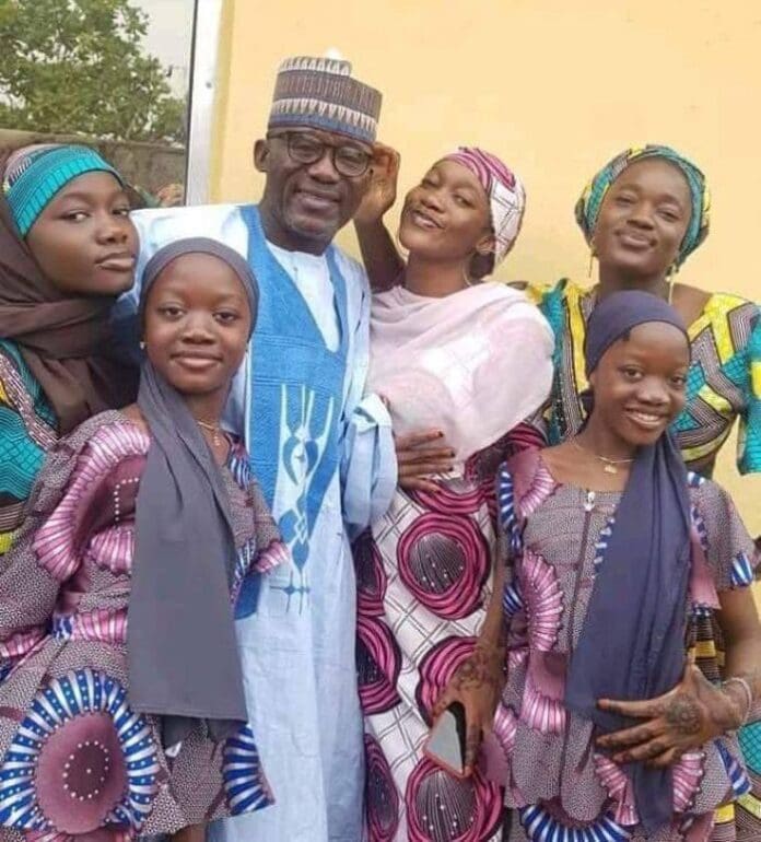 Alhaji Mansoor Al-Kadriyar with four of his daughters.