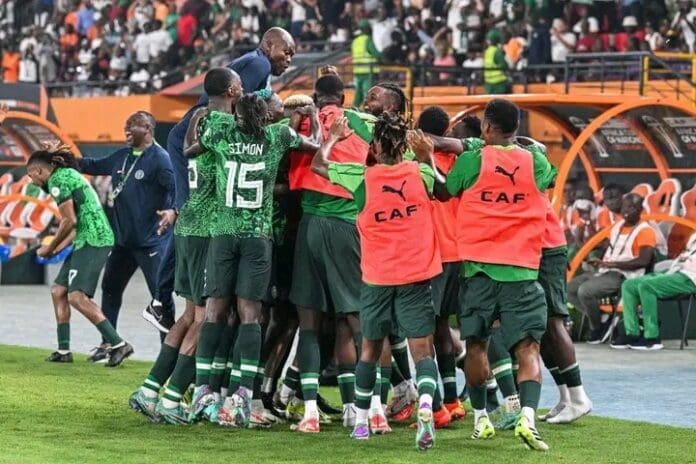 Nigerian team celebrating the 2-0 win over Cameroon. Photo credit: Facebook: Emmanuel Daraloye.
