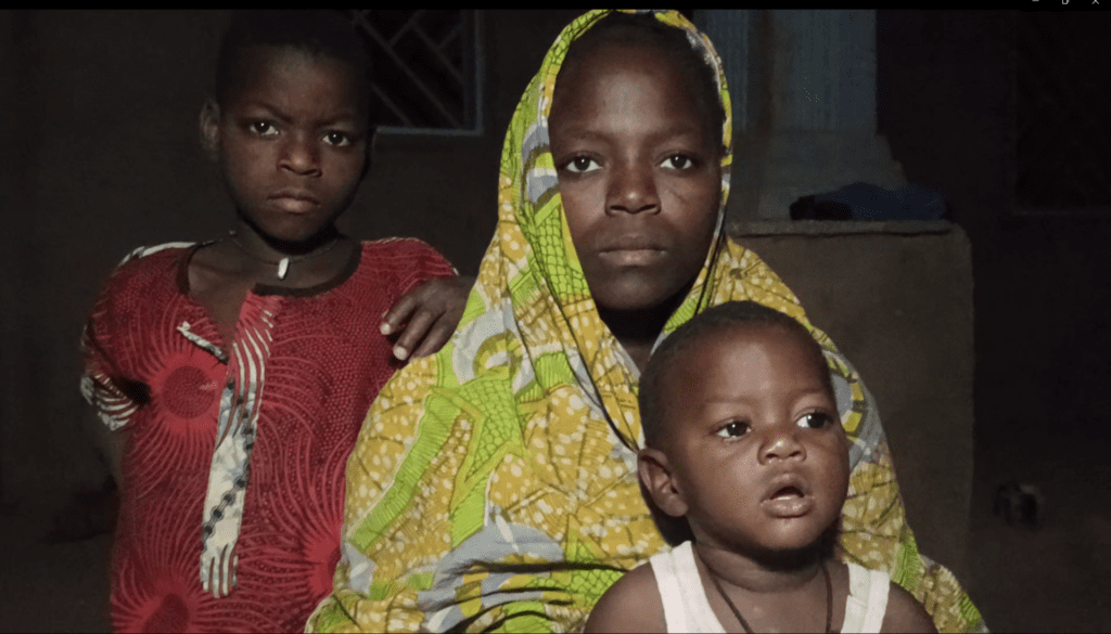 Mrs. Ladi Illiya, center, with Luis, left and Wisdom. credit Ehis Agbon.