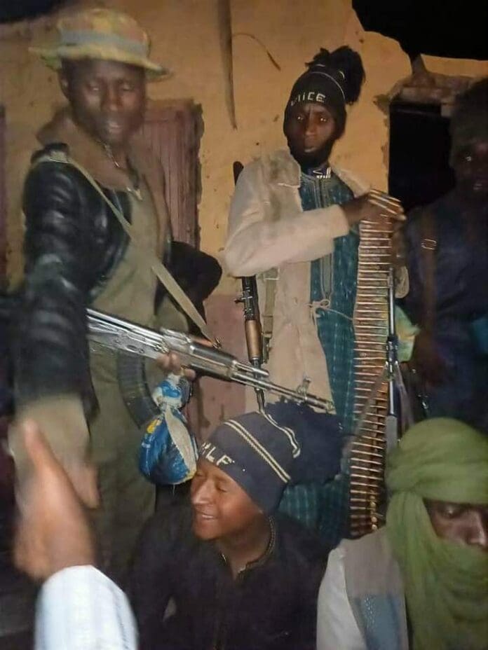Bandits gathering at a conclave of civilian leaders and hostage takers in Northern Niger State in February 2021. Credit: Mike Odeh James.