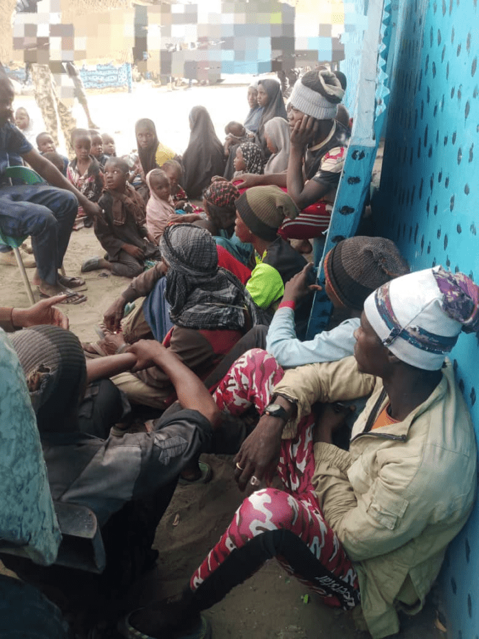 Boko Haram/ISWAP supporters who worked as farmers on land Boko Haram land stolen from legal owners. Kibaku community head tells TruthNigeria land has been seized from 10,000 Christian farmers and assigned to Muslim occupiers. Photo credit: Zagazola Makama.