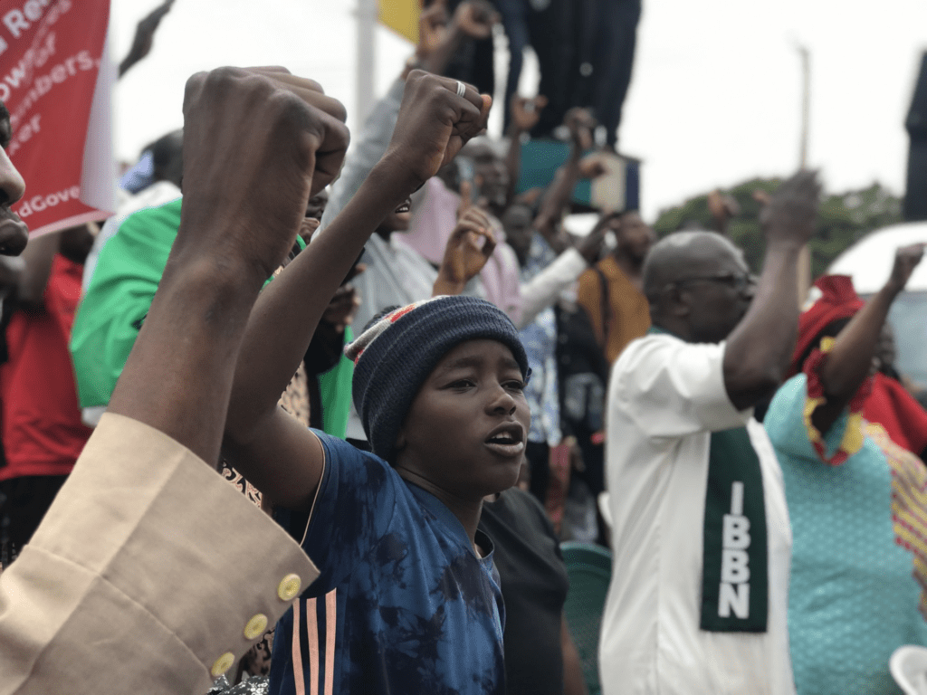 A future Nigerian leader raises his fist in protest against bad leadership in Jos on August 4. Credit Masara Kim