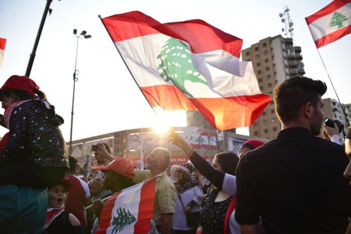 Crowd on street in Lebanon. Photo by Mohamad Mekawi via Pexels.