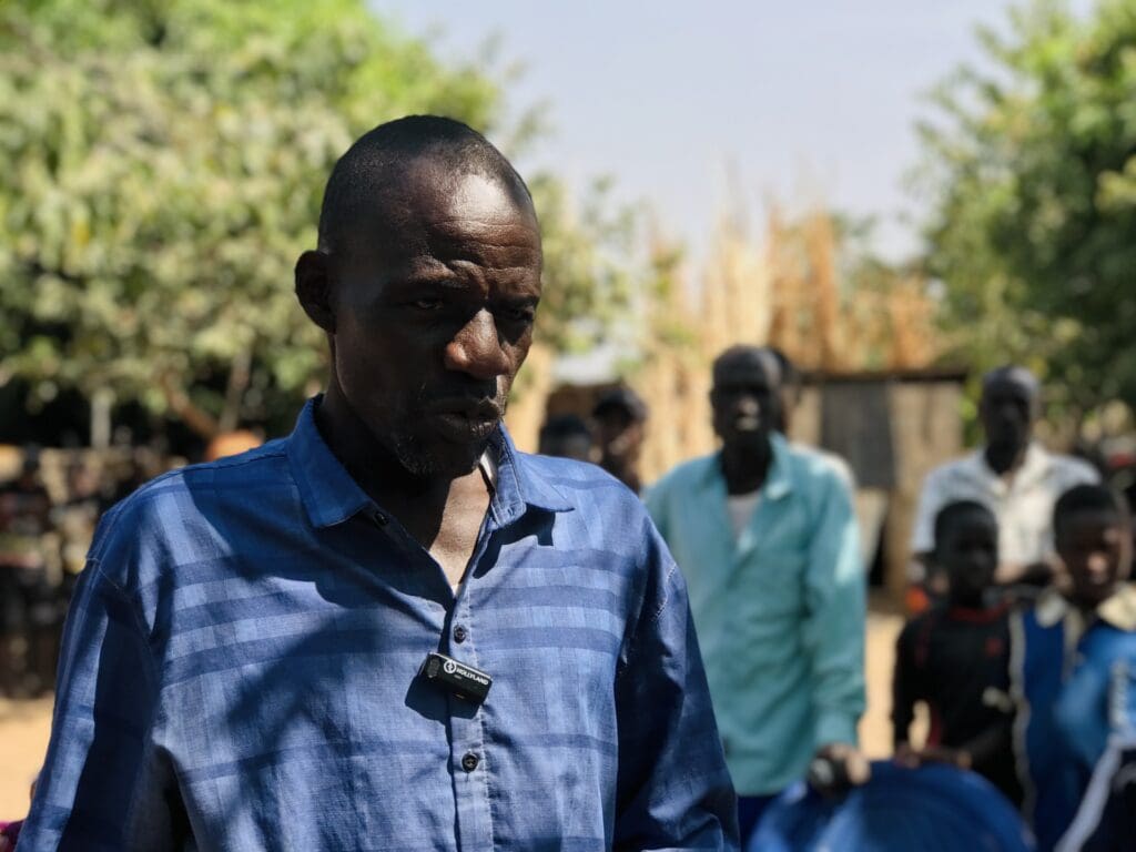 Camp chairman Gaji Yusuf Mazha, expresses gratitude for cow donation by ETPNI on behalf of IDPs near Abuja. Credit: Masara Kim.