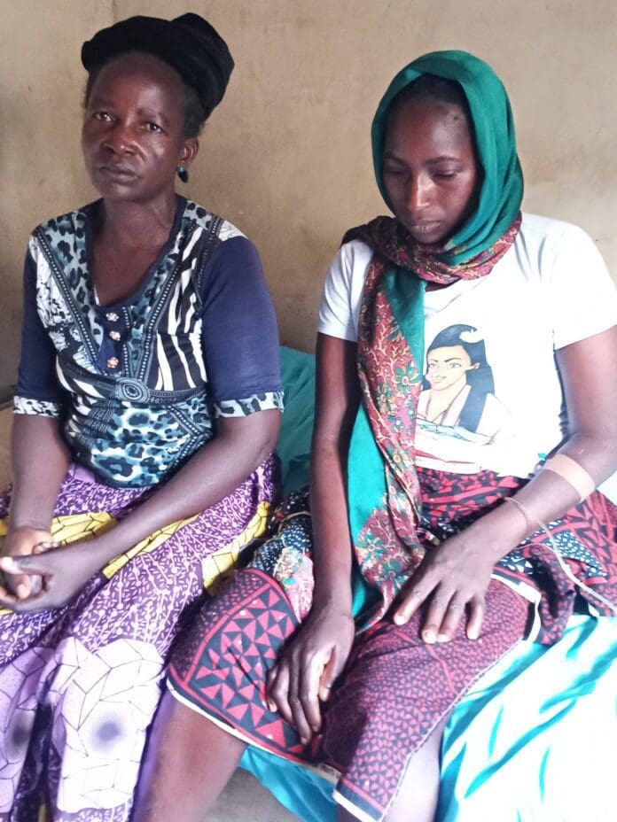 Caroline Emmanuel, 62, left with her daughter, Ladi Joel 36, (married with 5 children) at a private clinic at Maraban Kajuru town, Kajuru County, Tuesday (Credit: Luka Binniyat).