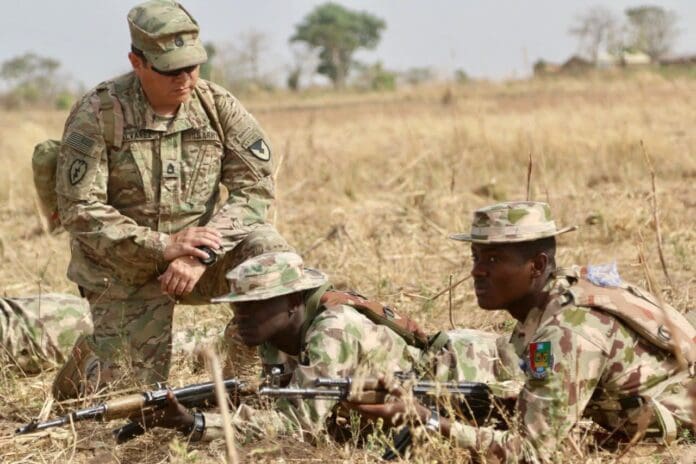 United States Military Trainer and Nigerian Military Trainees Credit: Nigerian Defense Headquarters .