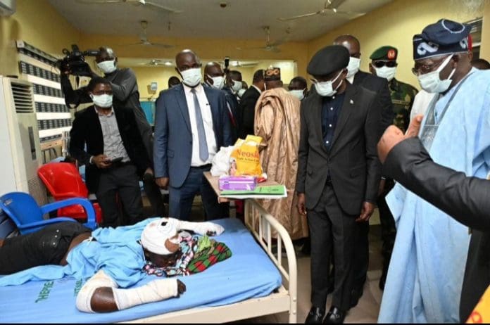 President Bola Tinubu during a visit to survivors of the 2025 Yelewata massacre at the Benue State University Teaching Hospital in Makurdi. Photo credit: X/@DOlusegun.