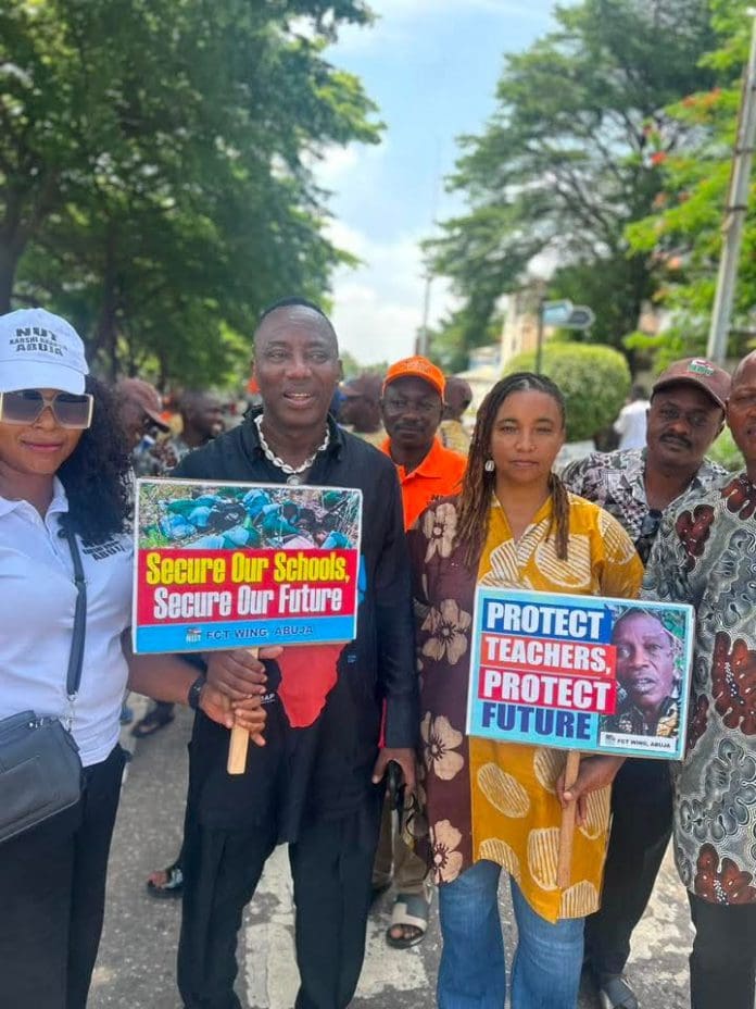 Top picture shows Omoleye Sowore, human rights activist and 2023 Presidential Candidate of Action Democratic Alliance (ADA) in black with beads over his neck in a mass protest in Abuja, Monday May 2, 2026 (Credit: Facebook).