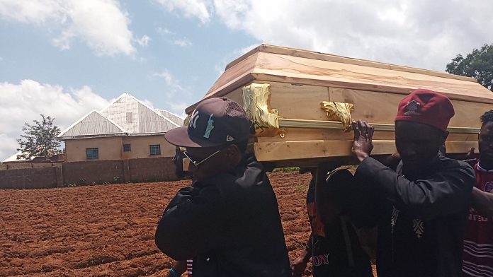 Mourners carry the coffin of John Telle Danjuma. Photo credit Lawrence Zongo TruthNigeria. 