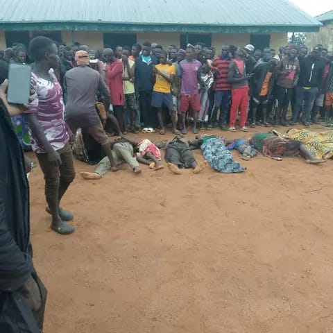 Villagers weeping in front of the dead bodies, Credit Sunday Aboh.