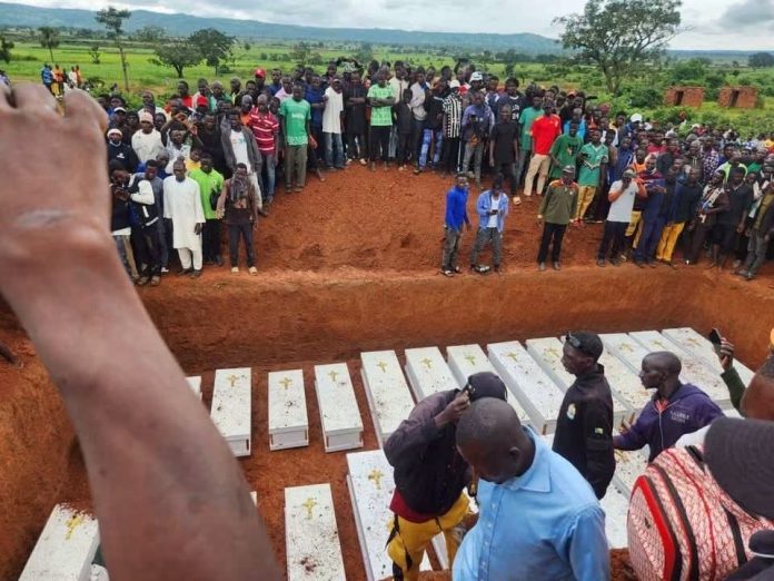Caskets bearing remains of 27 victims of Fulani Ethnic Million in a mass grave ready for burial at Naridon village Kamaru Ikulu of Kauru County of Southern Kaduna, August 1, 2026  (Credit: Steven Kefas Facebook page).