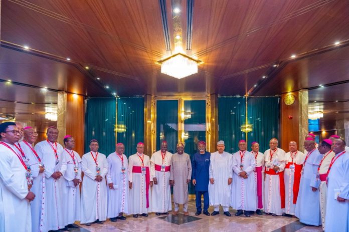 President Bola Tinubu in a group photograph with the Catholic Bishops of Nigeria during a courtesy visit at the State House Abuja | Photo Credit: National Accord